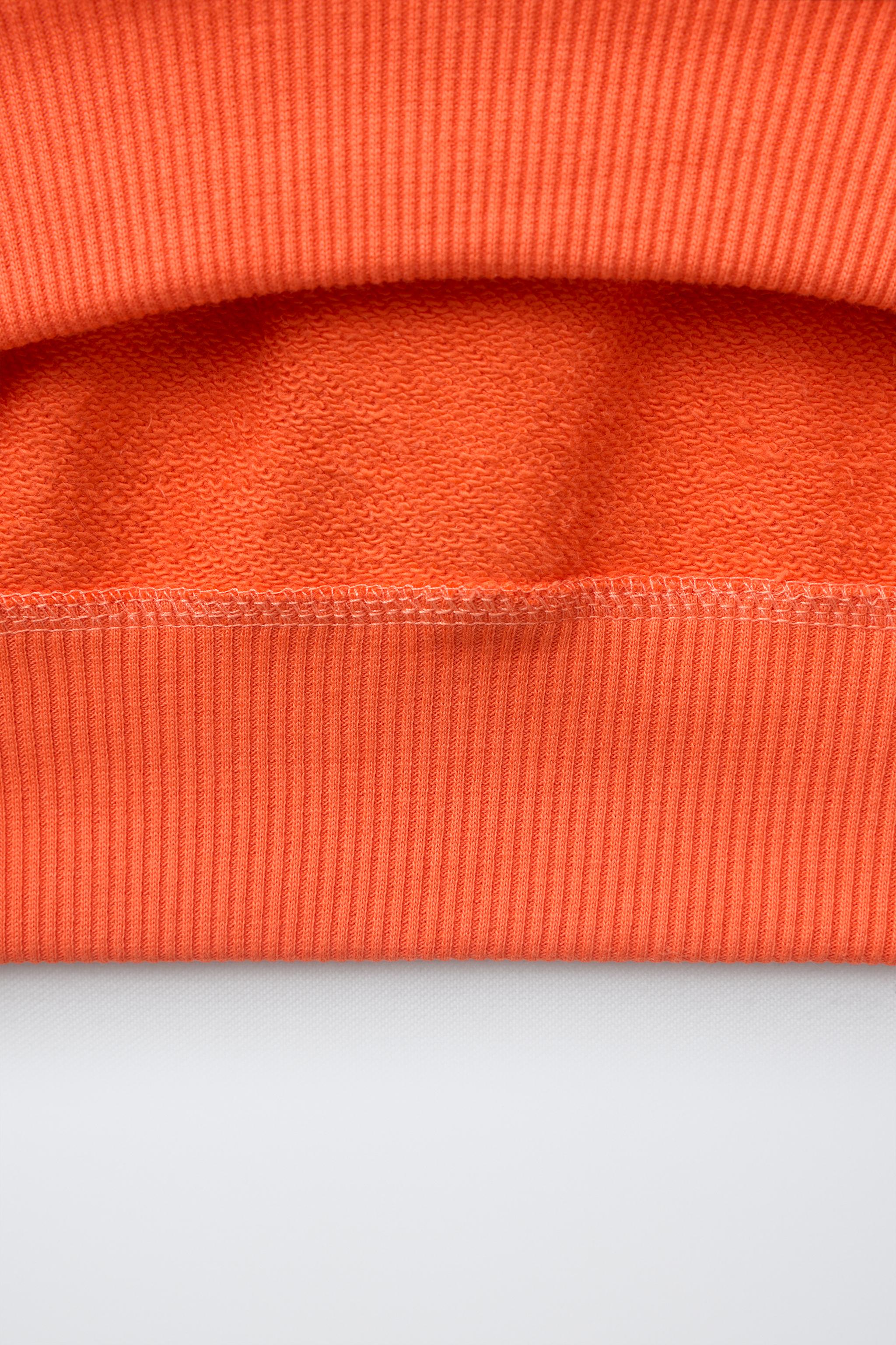SWEAT À INSCRIPTION BRODÉE