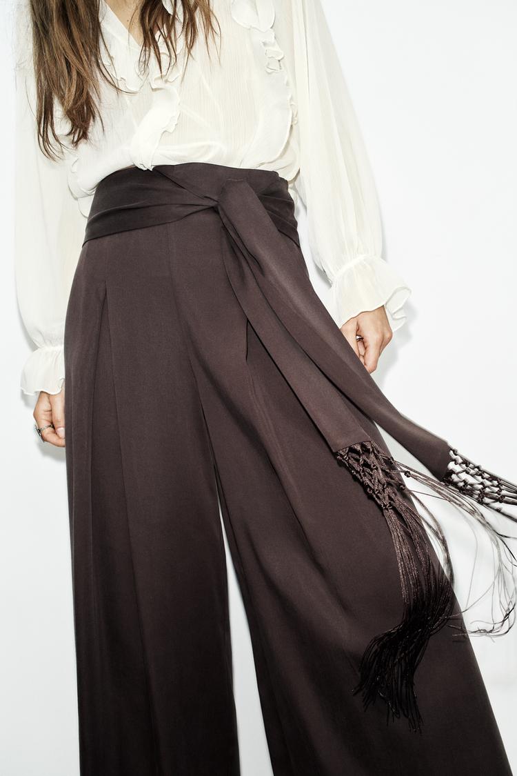 FRINGED BELT TROUSERS