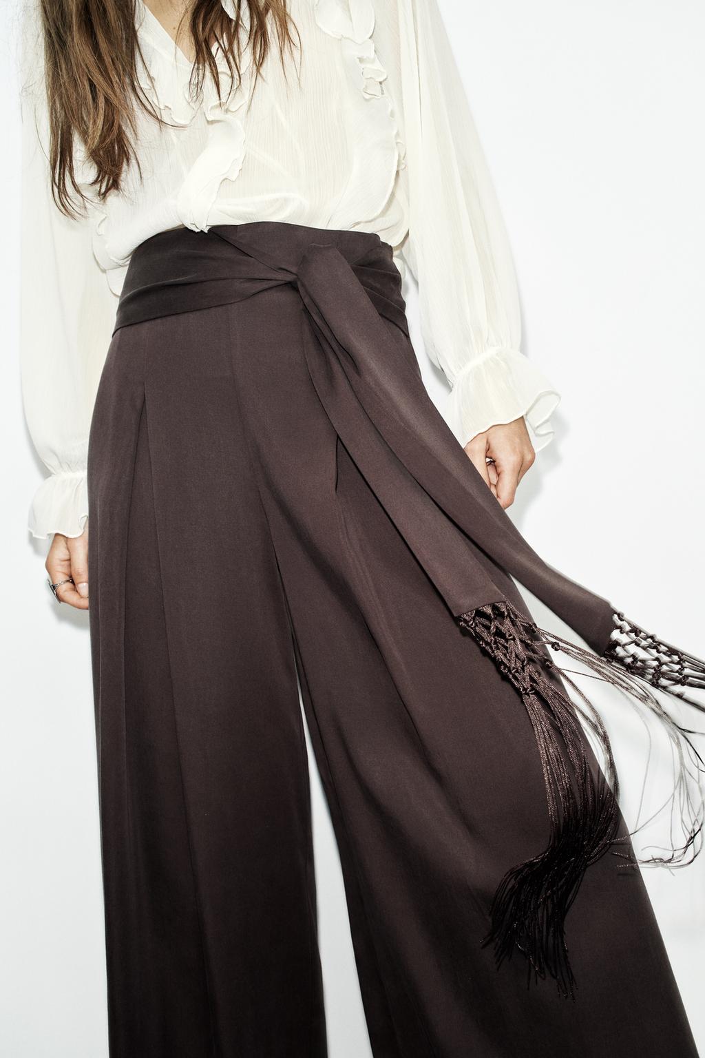 FRINGED BELT TROUSERS