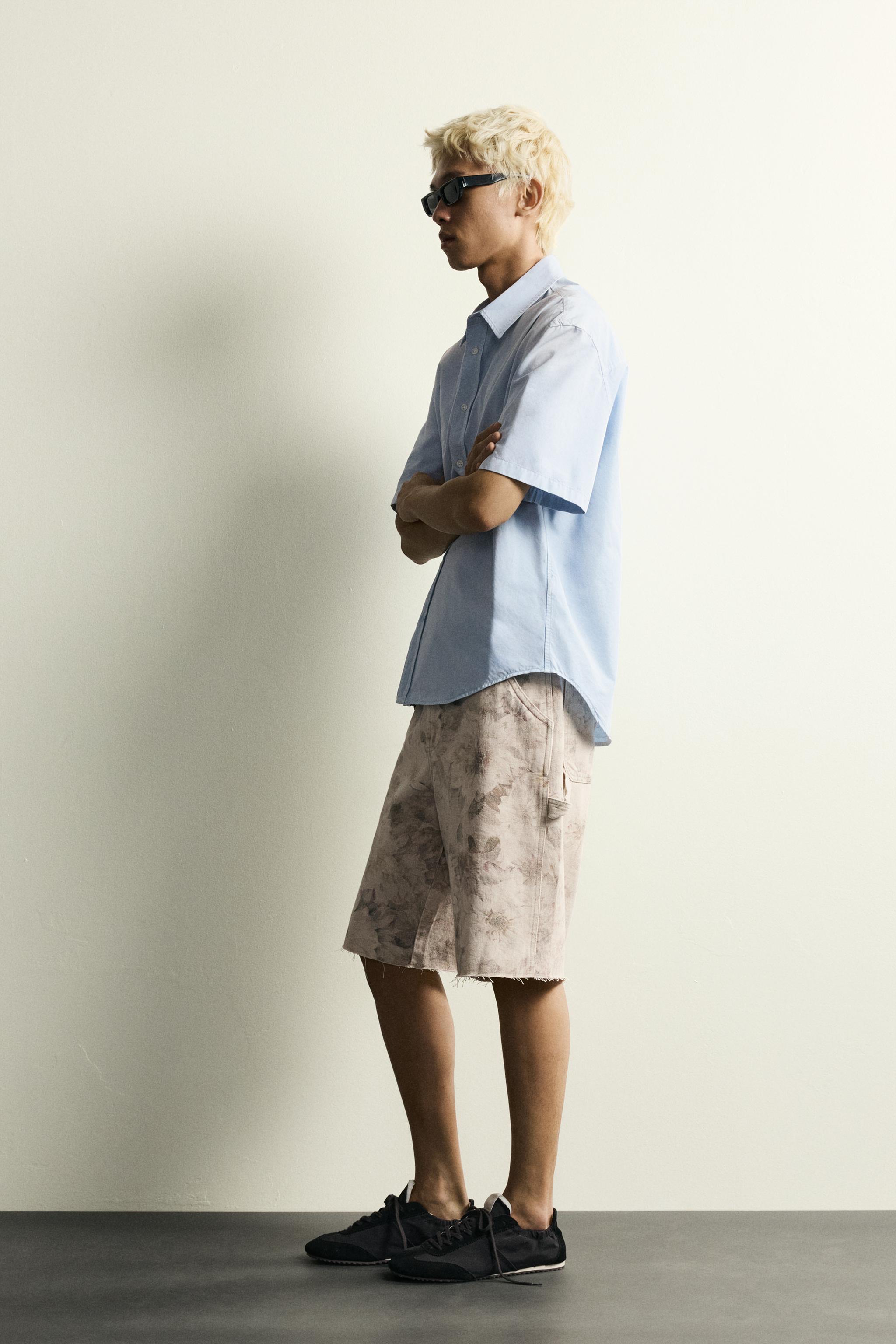 WASHED FLORAL PRINT CARPENTER SHORTS