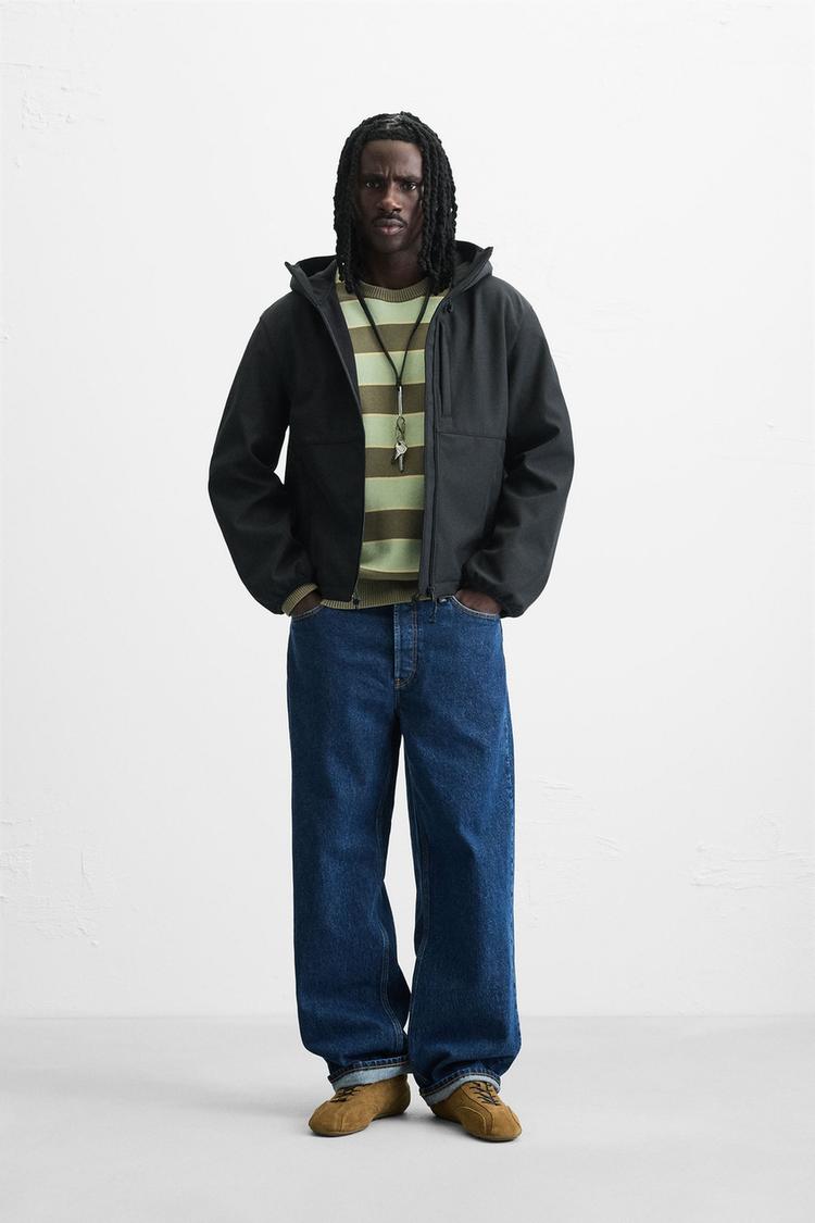 JAKKE I FUNKTIONSSTOF MED FLEECE
