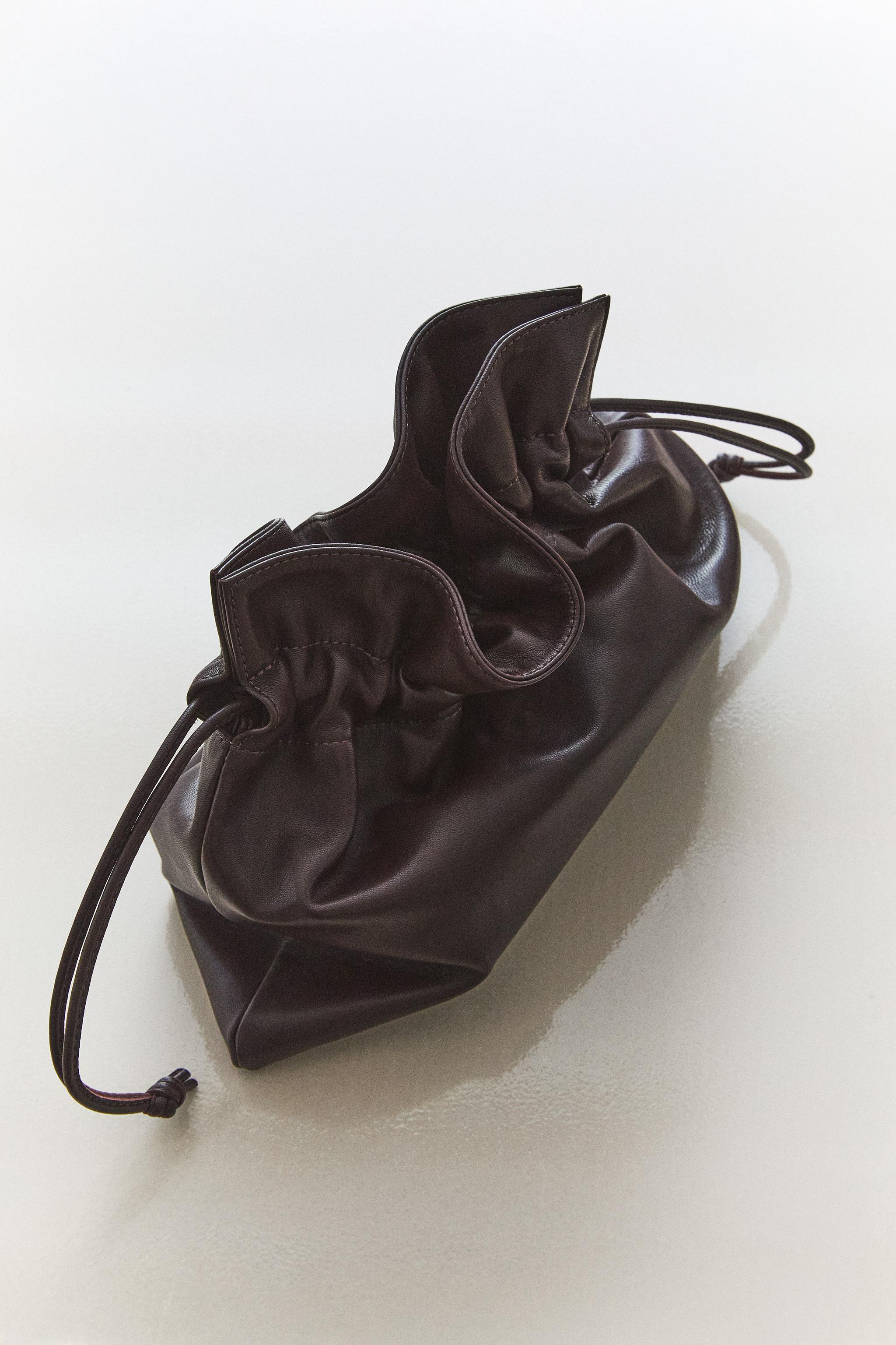 POCHETTE EN CUIR