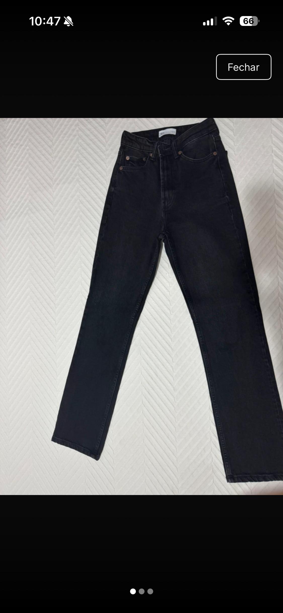 Black jeans on a white surface with a zigzag texture. Casual style. Text: 10:47, 66, Close.