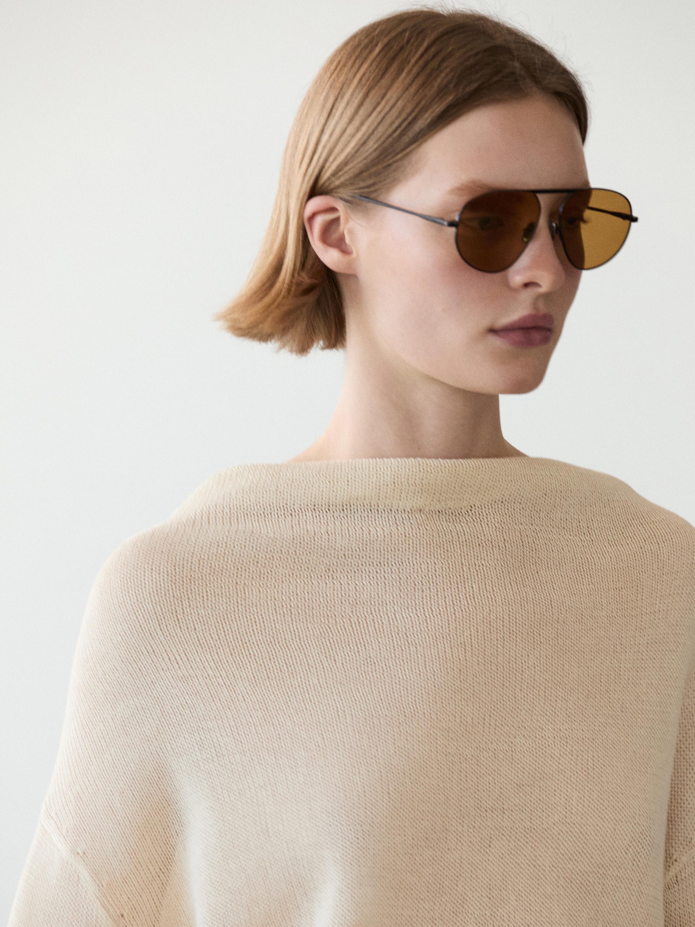 100% cotton knit sweater with back ties