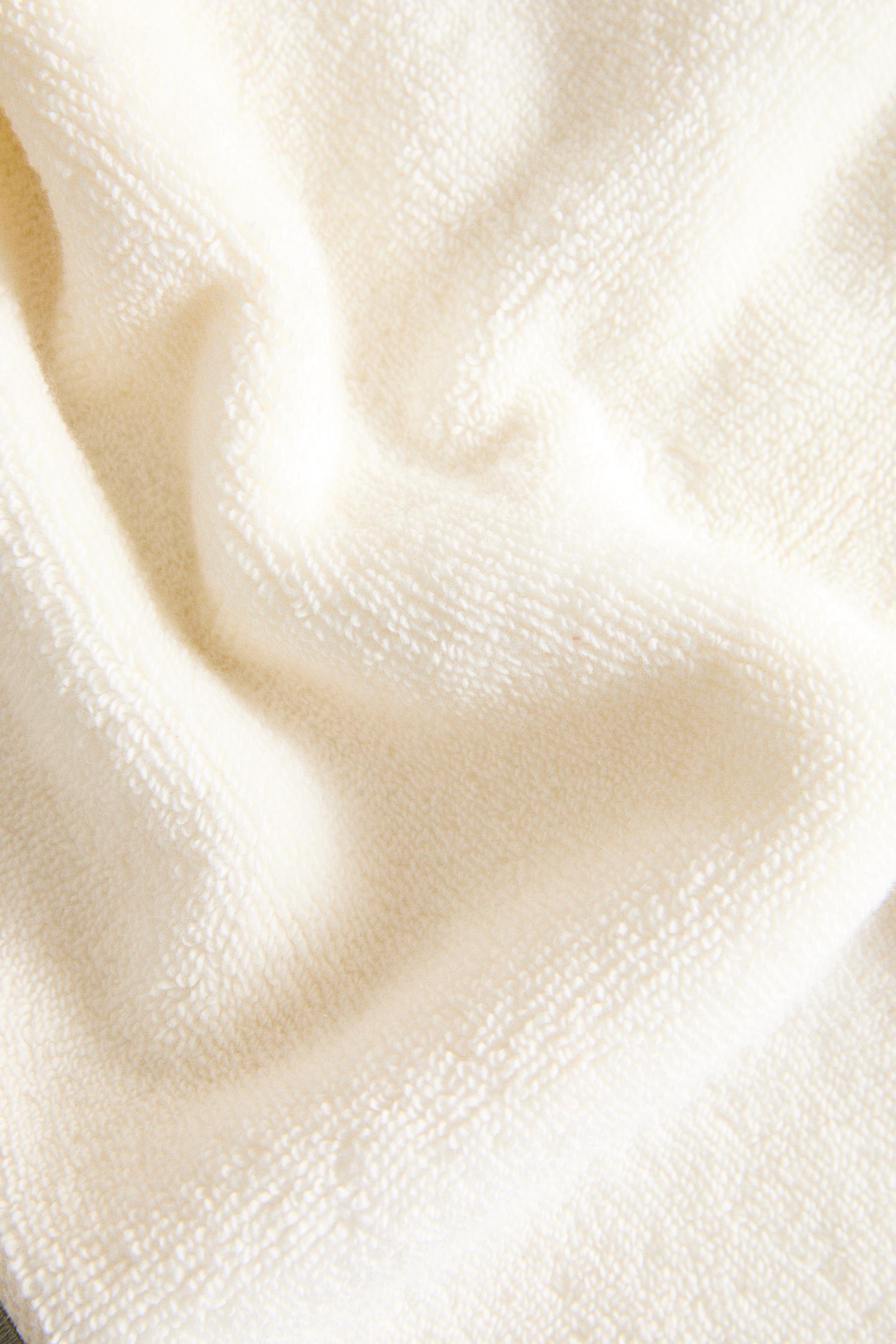 SERVIETTE DE BAIN FESTON BROD