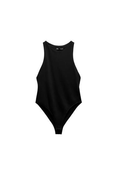 Front view of a black bodysuit with a round neck and high-cut legs.