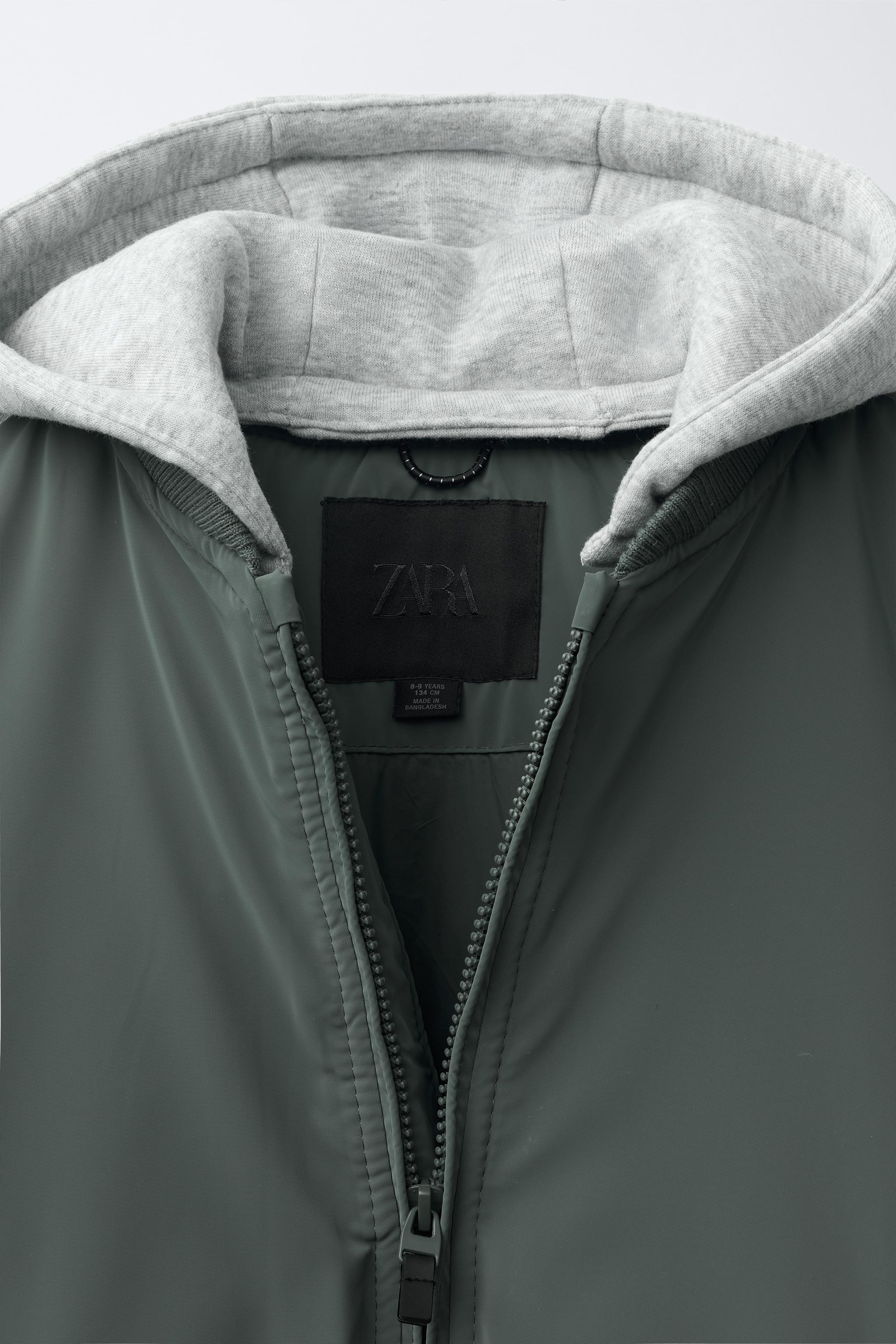 BLOUSON BOMBER GOMMÉ À CAPUCHE AMOVIBLE
