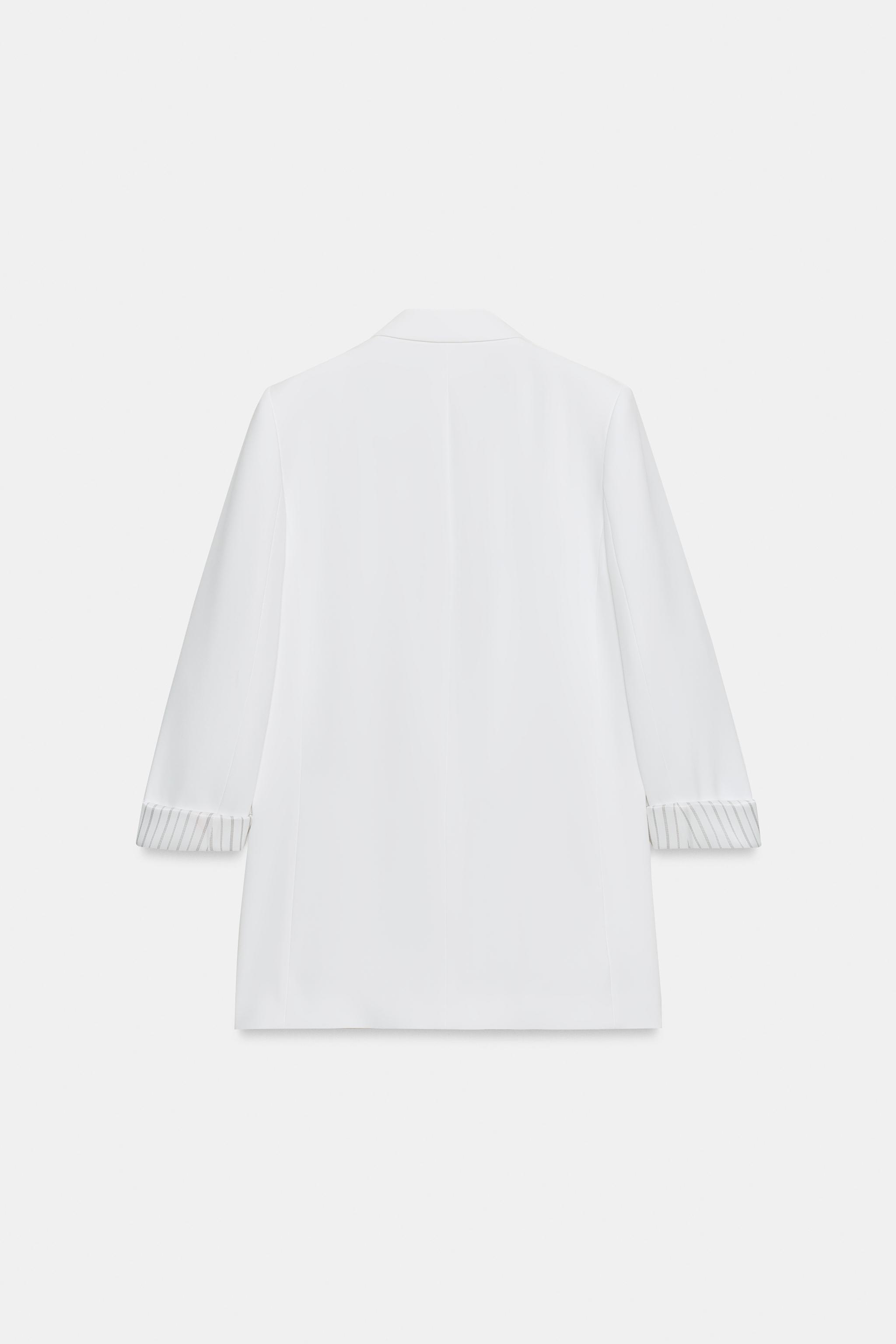 VESTE À MANCHES RETROUSSÉES ET POIGNETS IMPRIMÉS