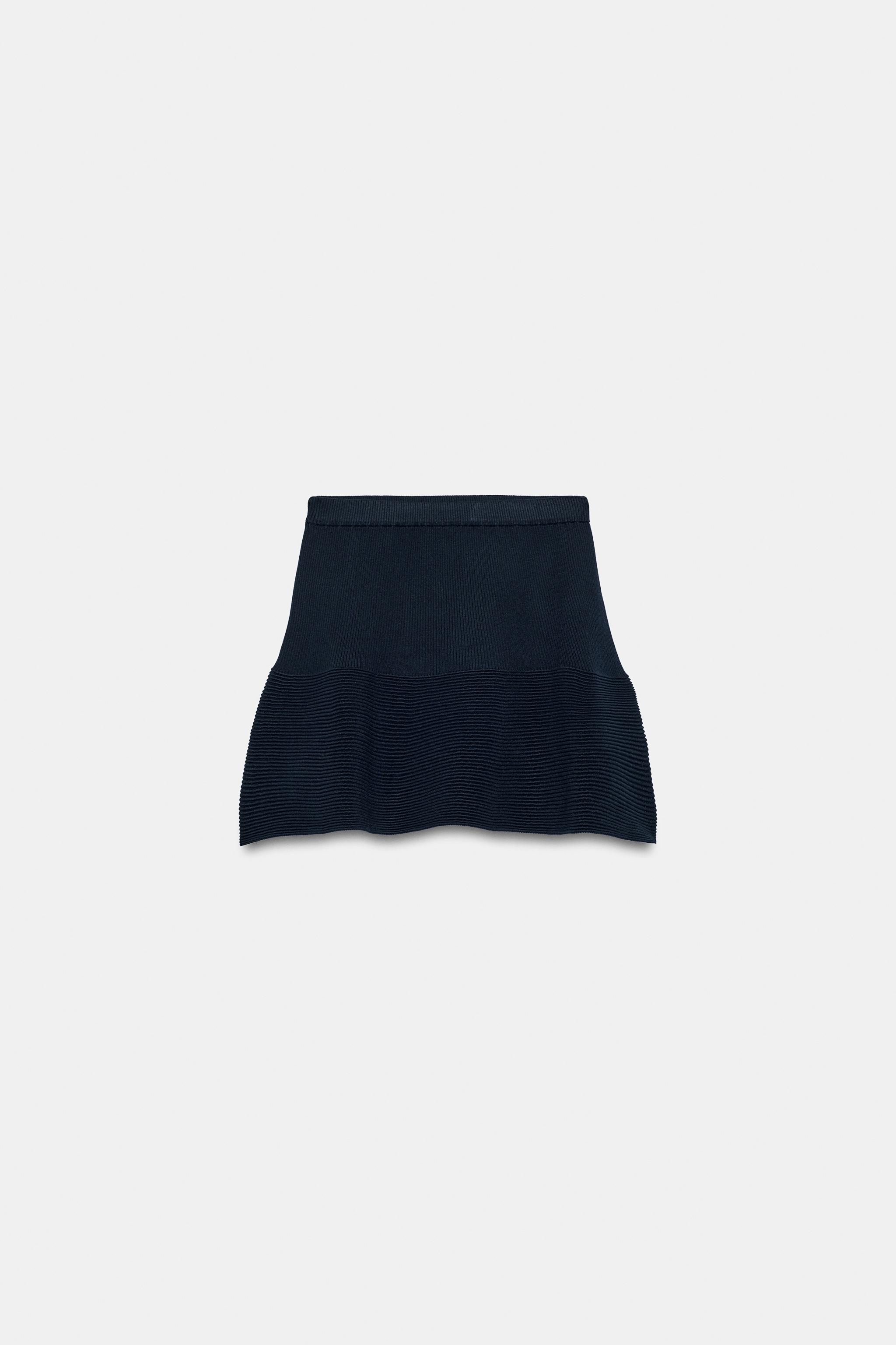 PEPLUM KNIT MINI SKIRT