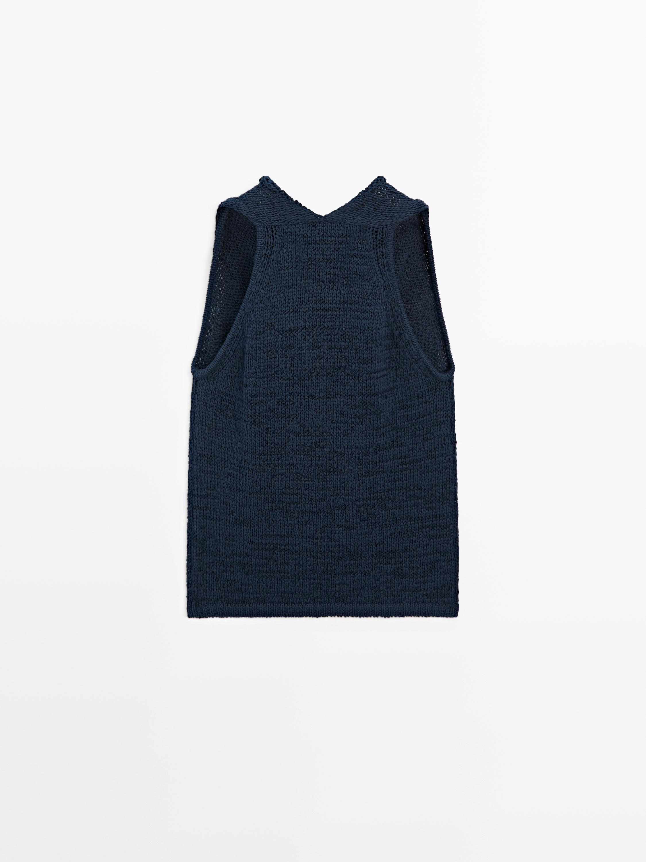 Knit top with draped neckline