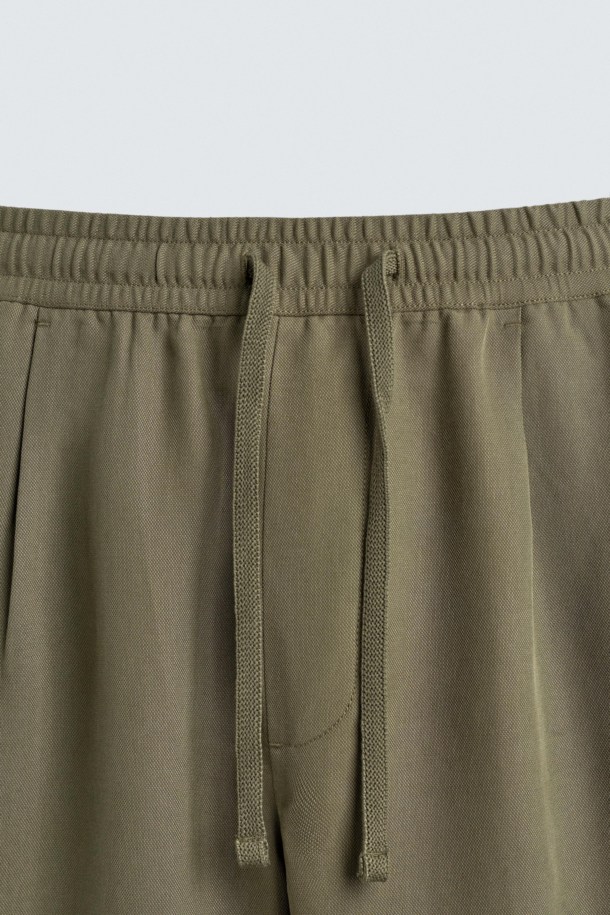 RELAXED FIT FLOWY PANTS