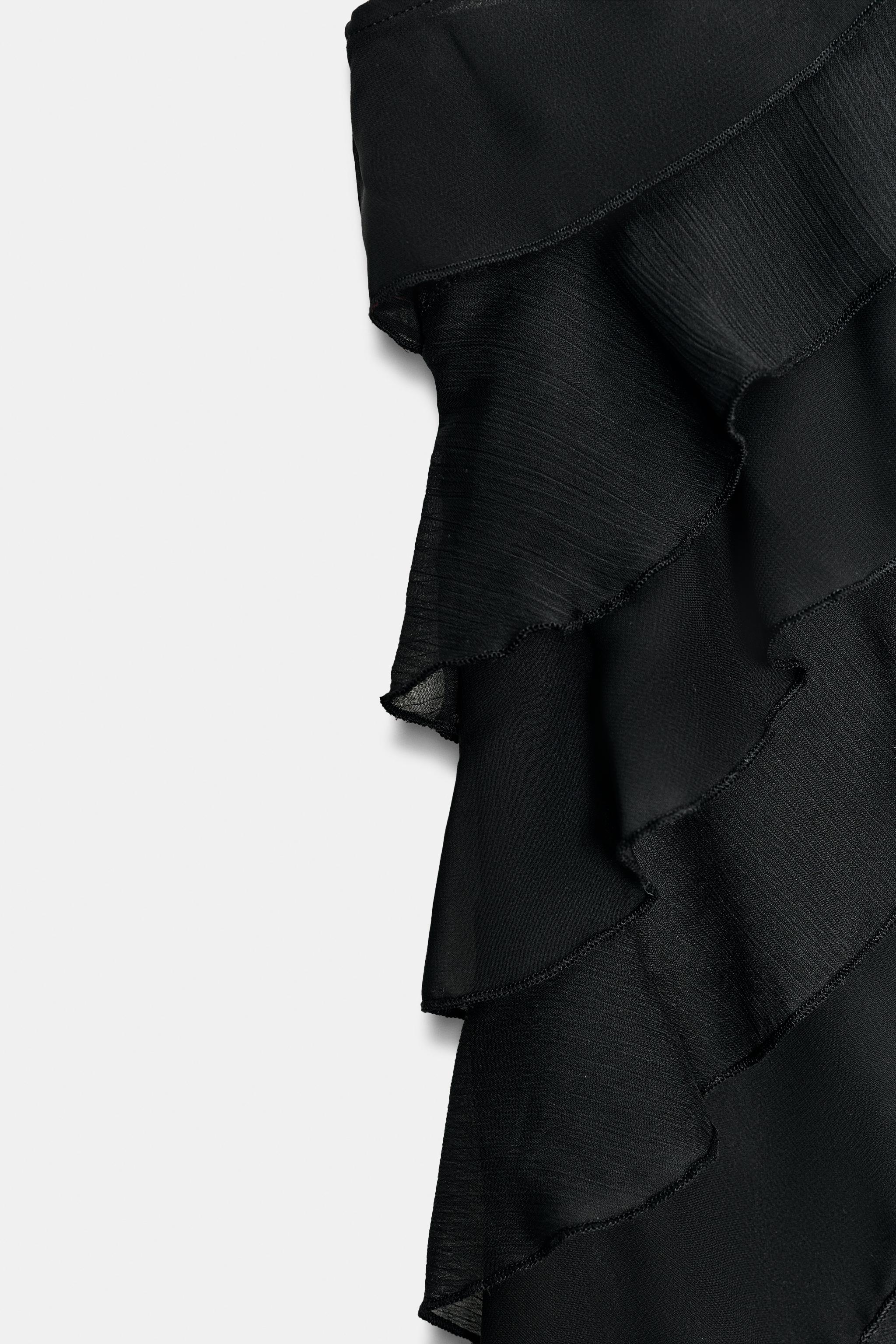 ASYMMETRICAL RUFFLE TOP