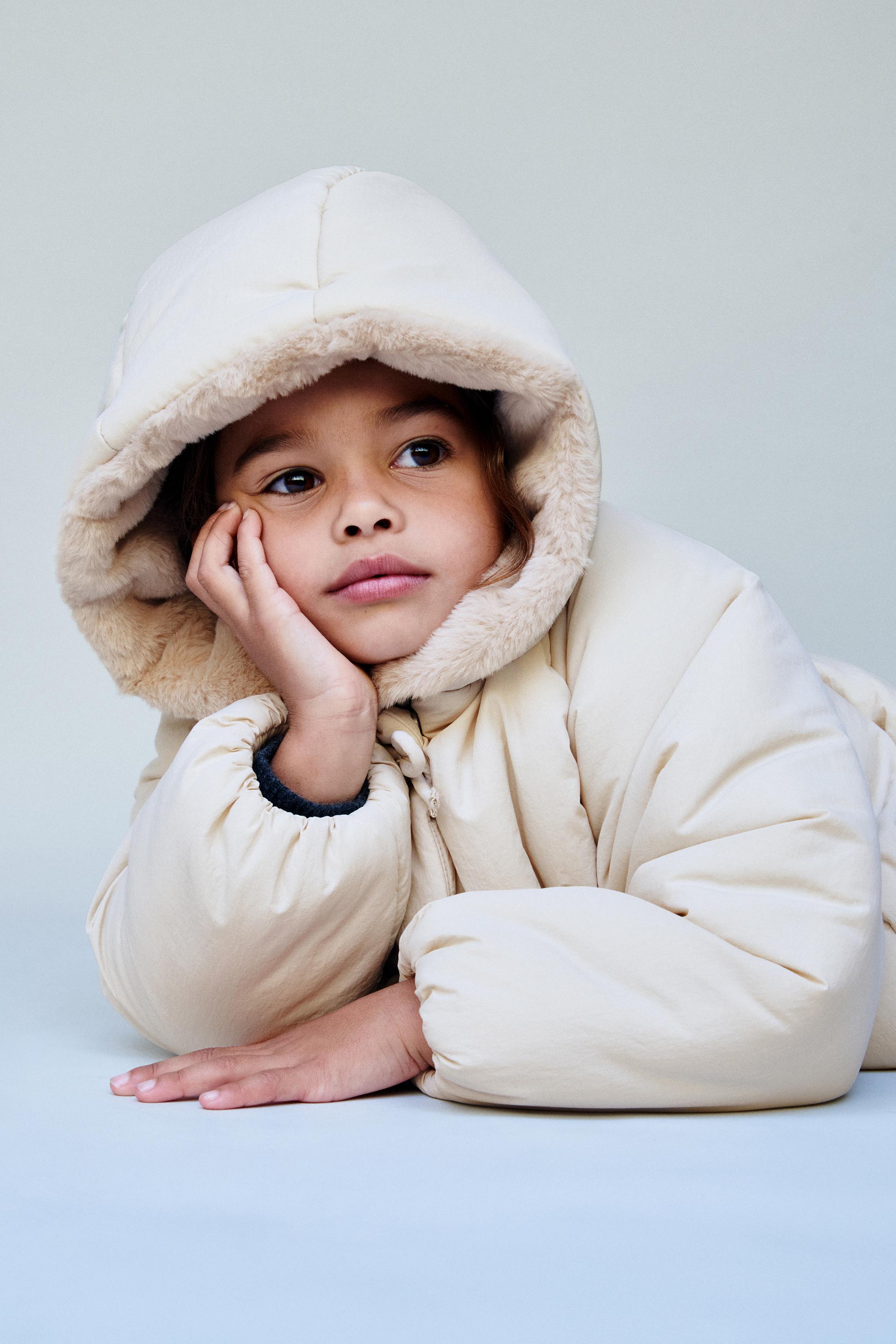 WATER REPELLENT PUFFER COAT WITH BOWS