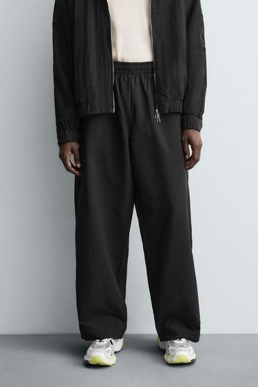 CALÇA TÉCNICA COM FAIXAS - Preto da Zara