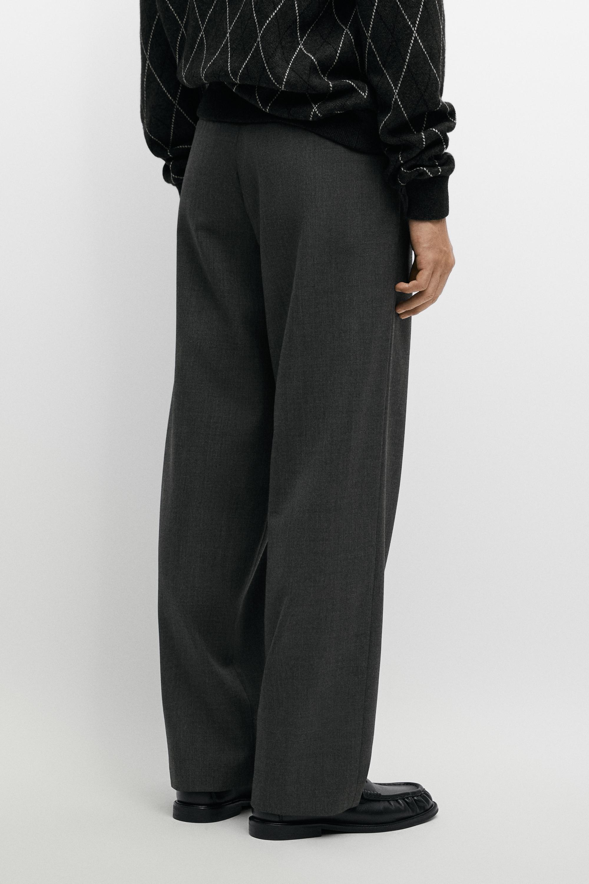 100% cool wool relaxed fit pants with darts