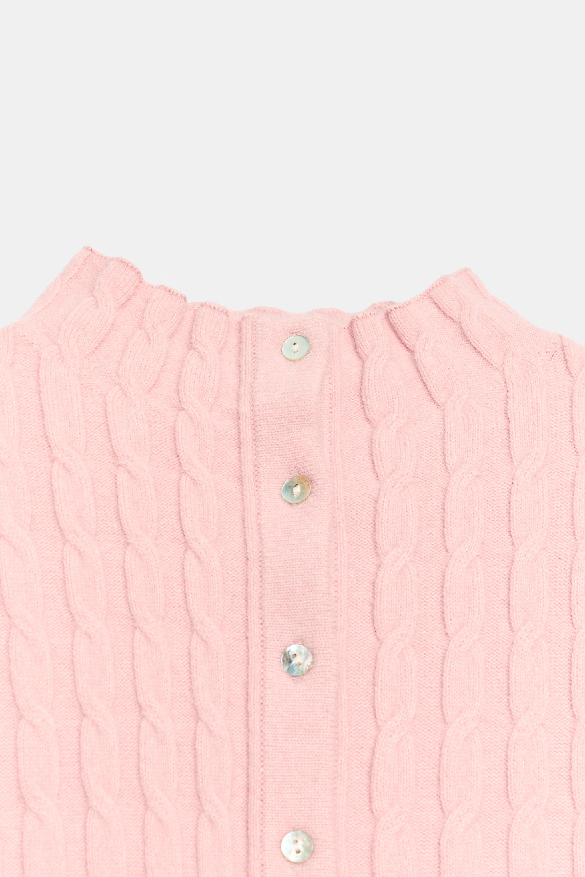 GILET EN MAILLE À TORSADES ET VOLANTS