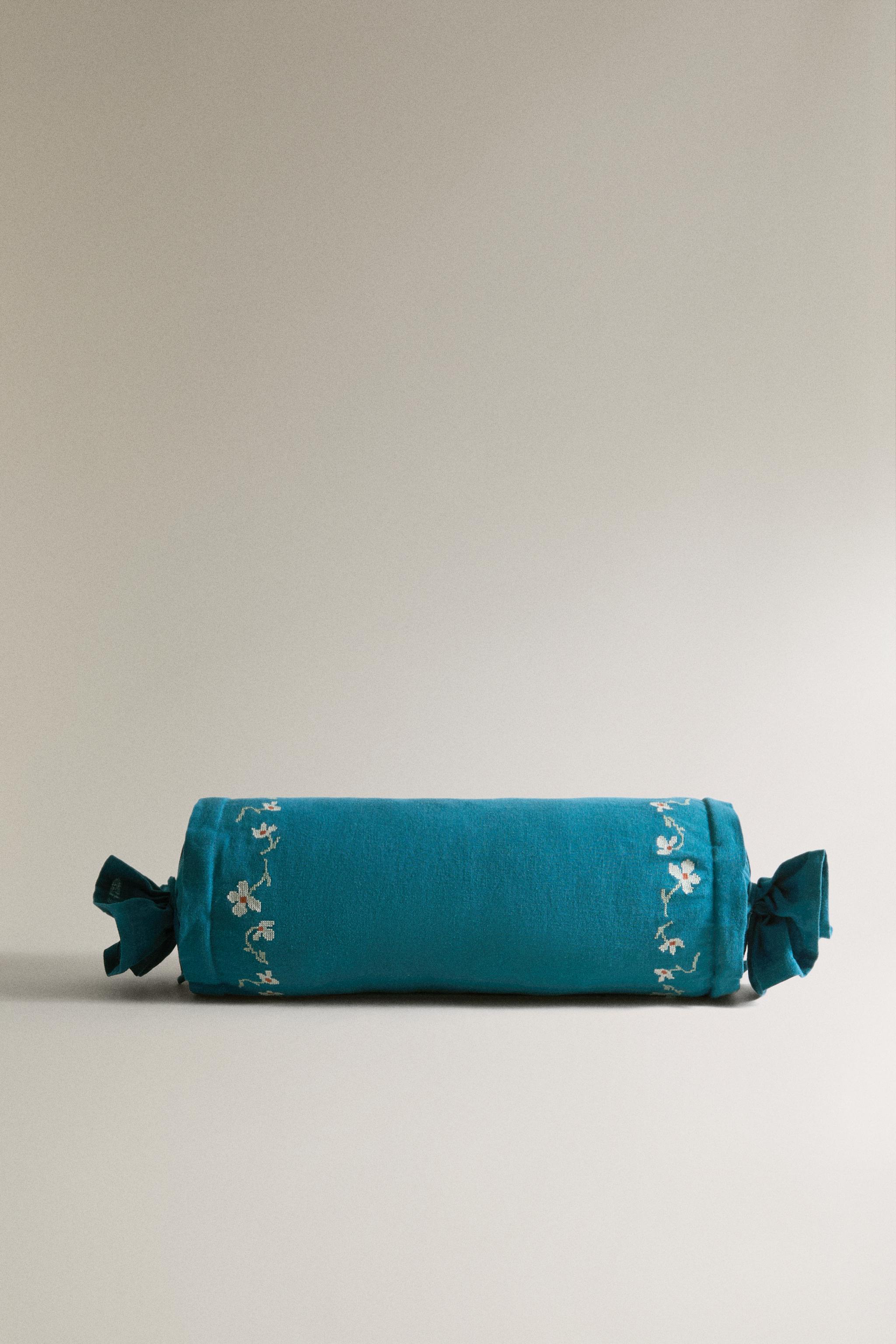 EMBROIDERED FLORAL BOLSTER PILLOW