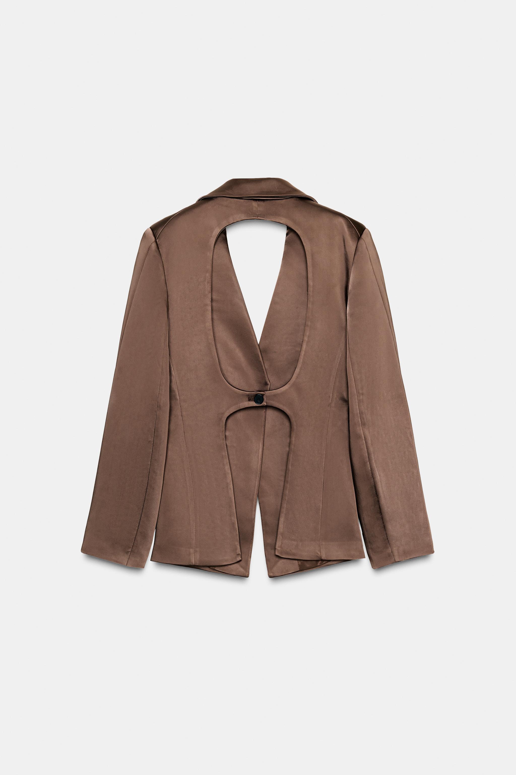 VESTE SATINÉE À OUVERTURES DANS LE DOS
