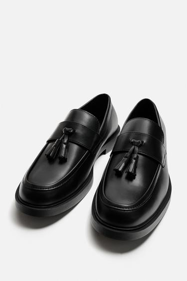 MOCASSINS CHICS À POMPONS - Noir de Zara - Image 1