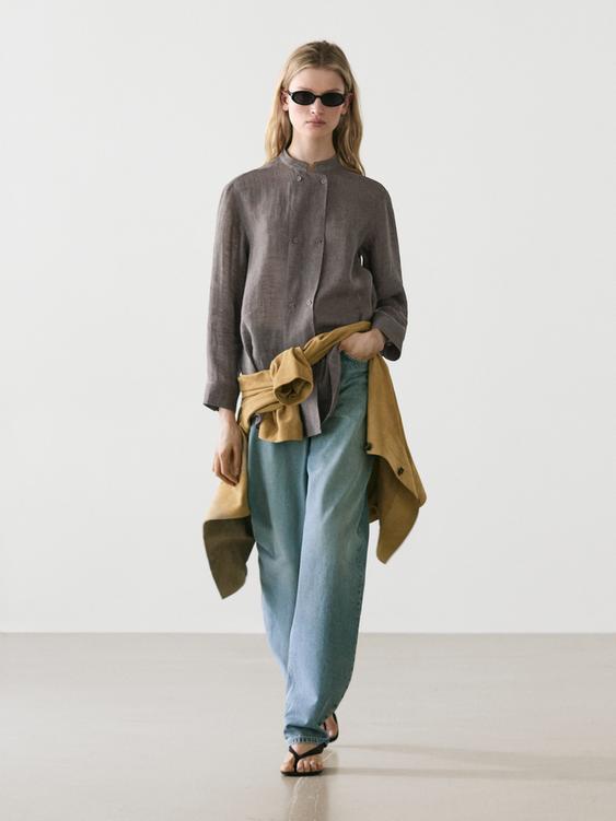 Flowing linen blend shirt with button details from Zara - $110