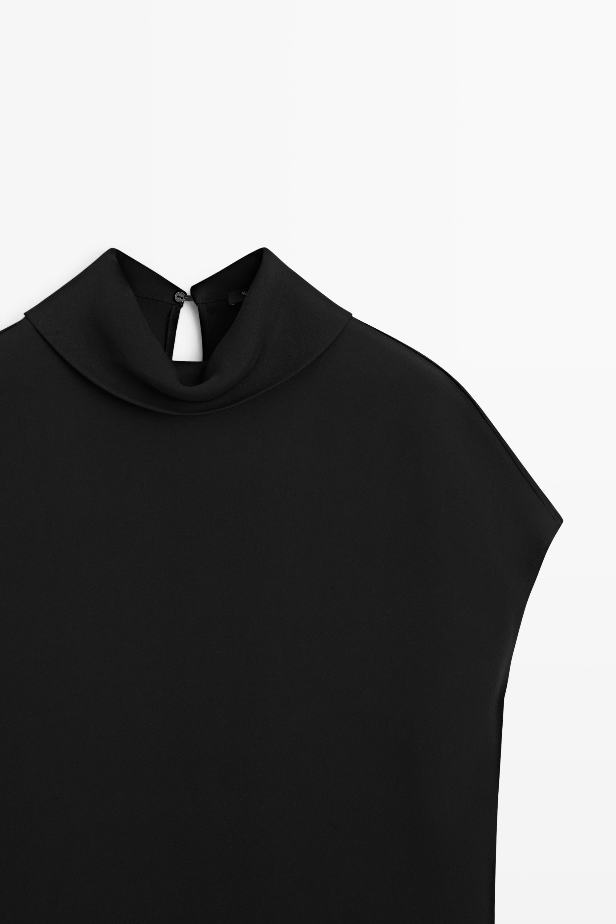Top col roulé emmanchures larges