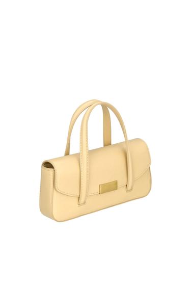 Beige handbag with double handles and a gold metal clasp on a white background. Elegant and minimalist design.