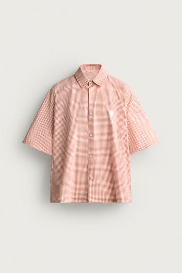 CAMISA BOXY FIT TEXTOS ESTAMPADOS - blanco-naranja de Zara