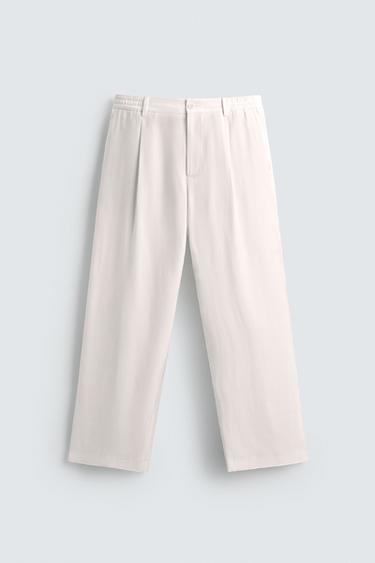 PANTALÓN RELAXED FIT PLIEGUES - Blanco de Zara