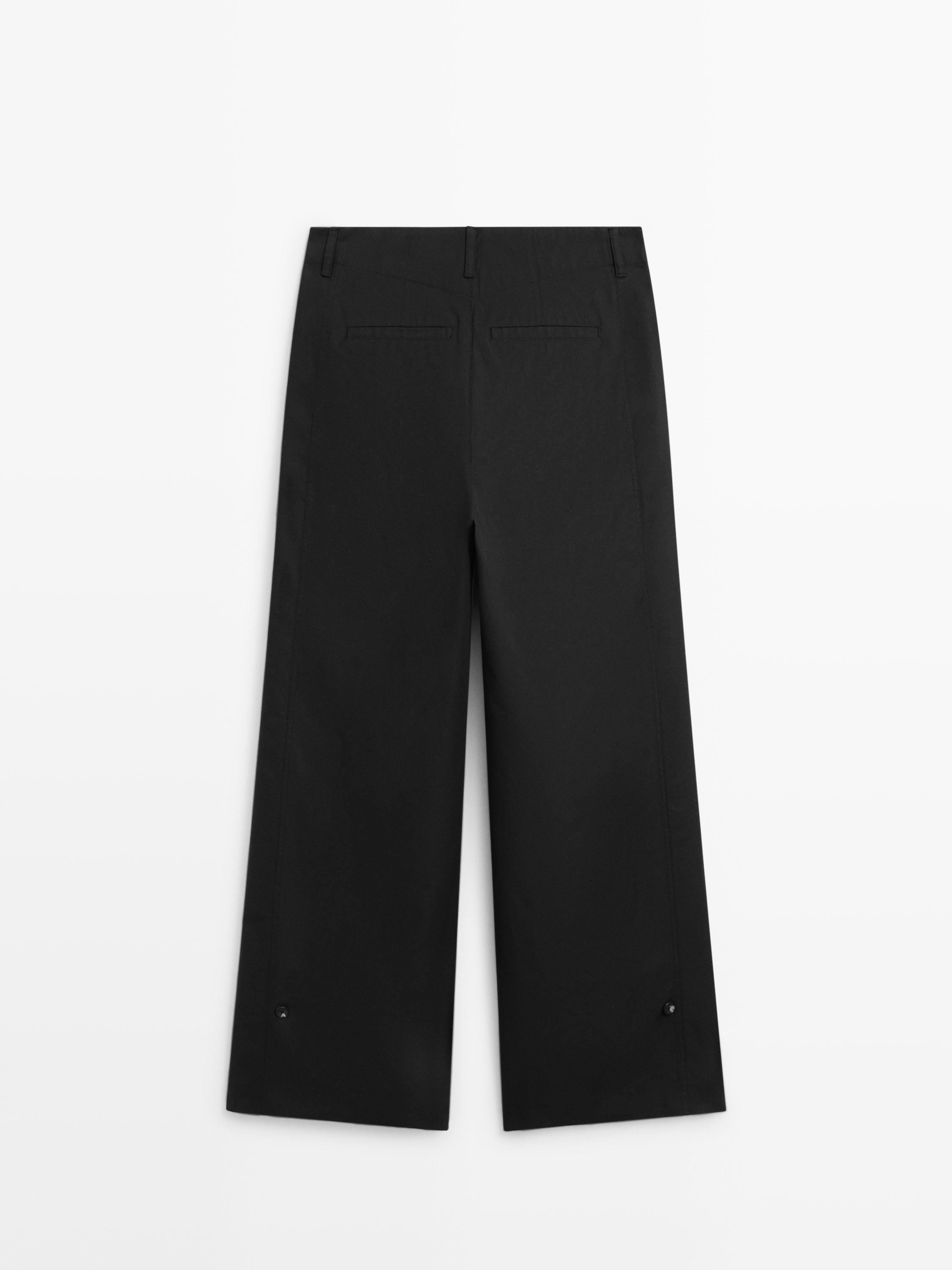 Cotton blend trousers with hem detail