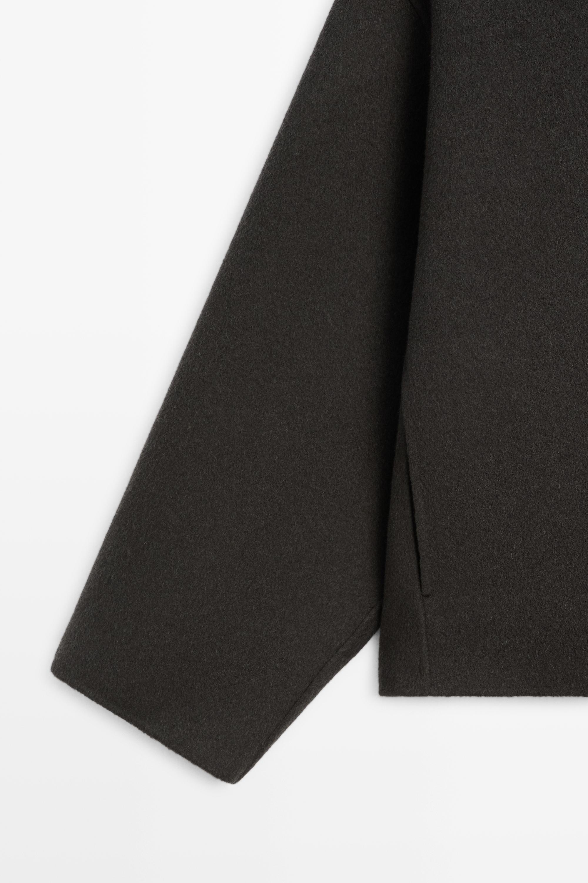 Short wool-blend coat with button detail