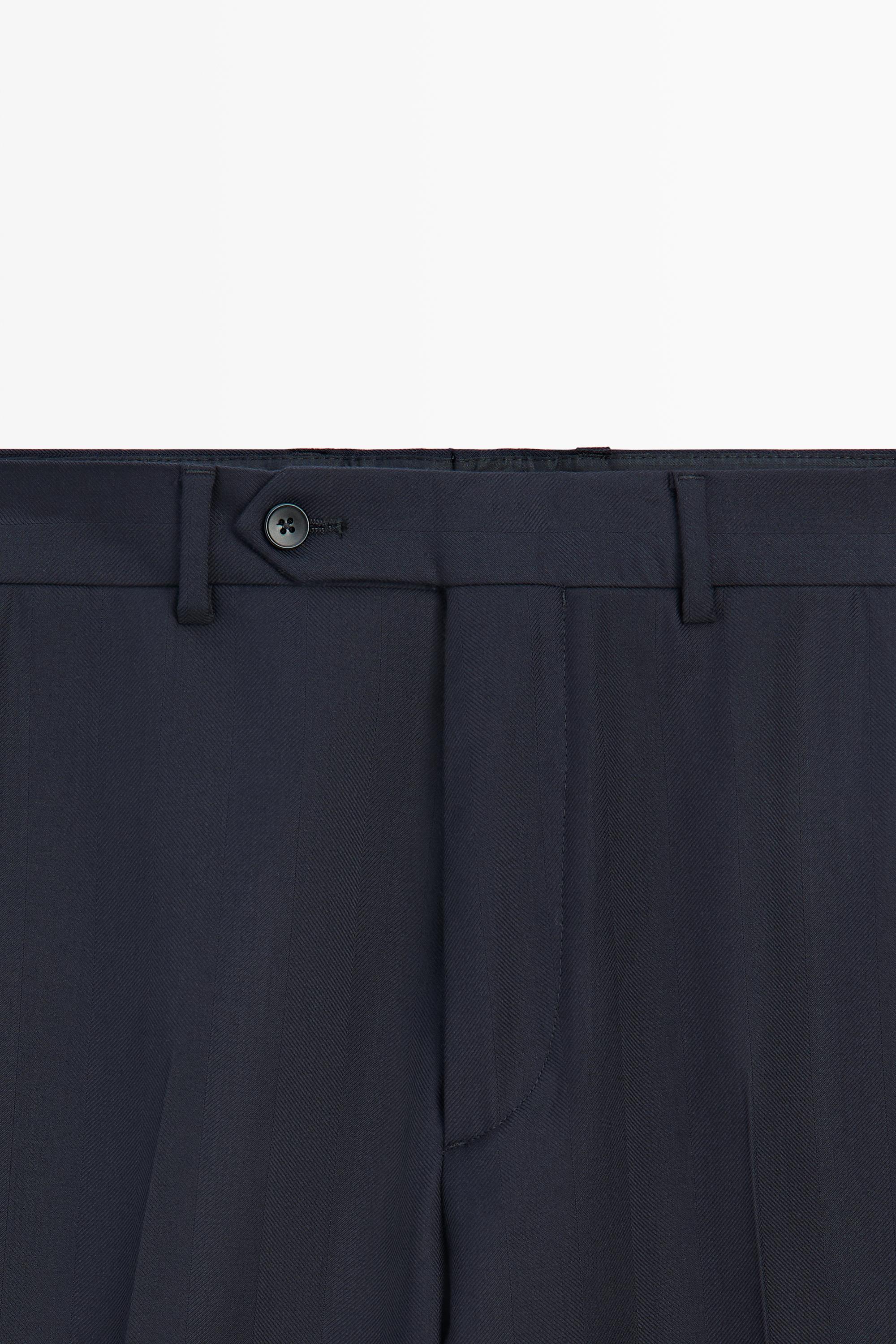 Pantalon tailleur à chevrons
