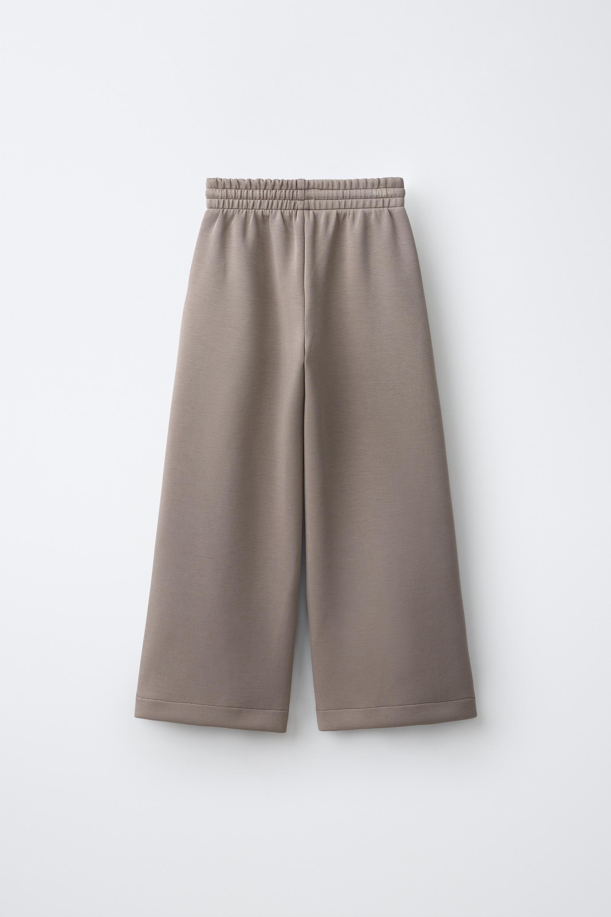 PANTALON SPORTY À JAMBES LARGES