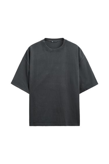 Relaxed-fit, short-sleeve, crew-neck t-shirt in dark gray on a white background.