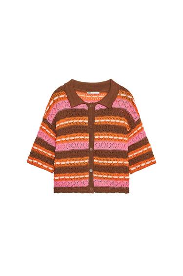 Front view of multicolor top with polo collar, short sleeves, horizontal stripes, and front button closure.