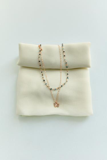 PACK OF TWO NECKLACES WITH BUTTERFLY BEADS - Golden by Zara