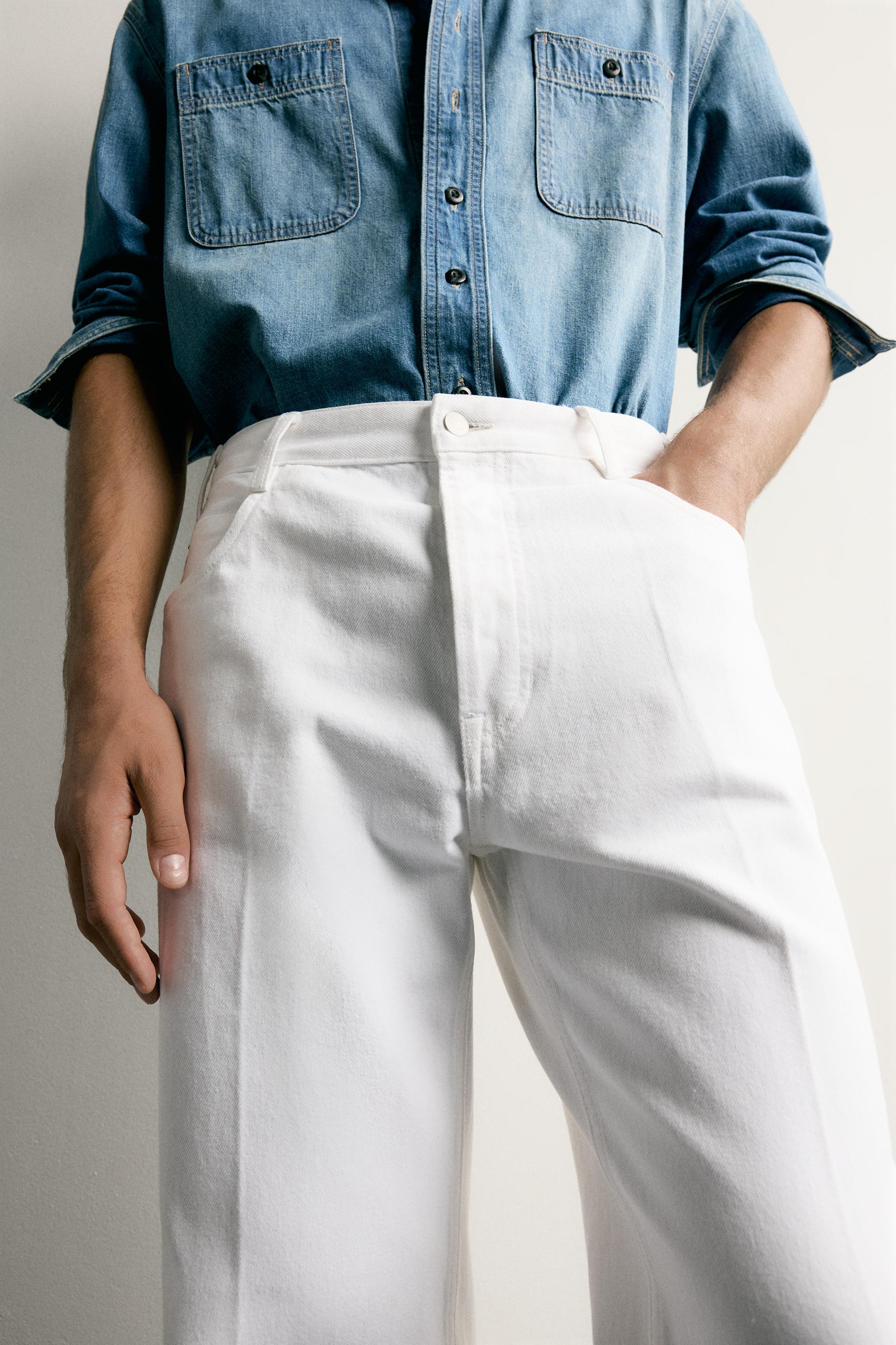 JEAN RELAXED FIT À PLIS