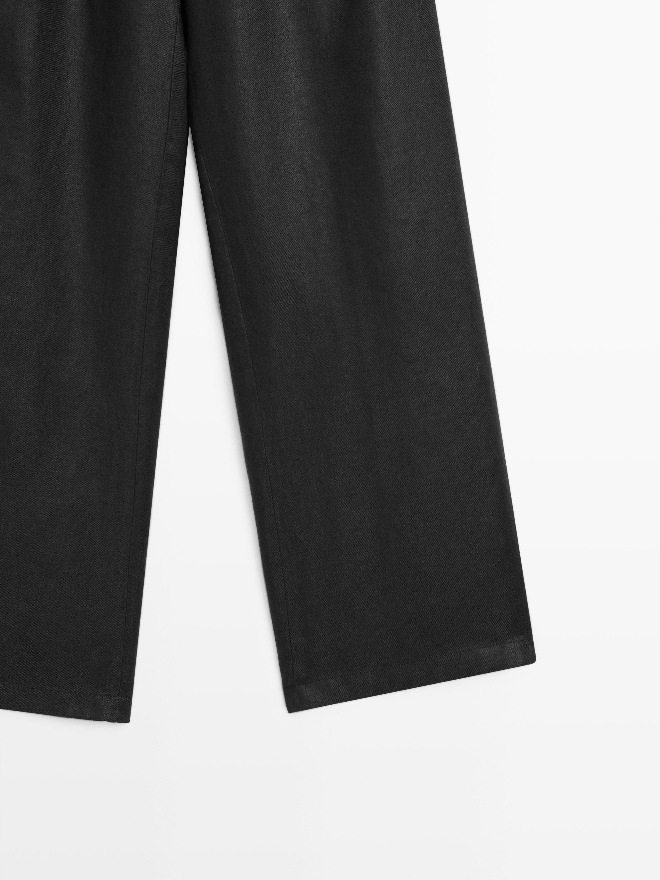 100% linen wide-leg elasticated trousers