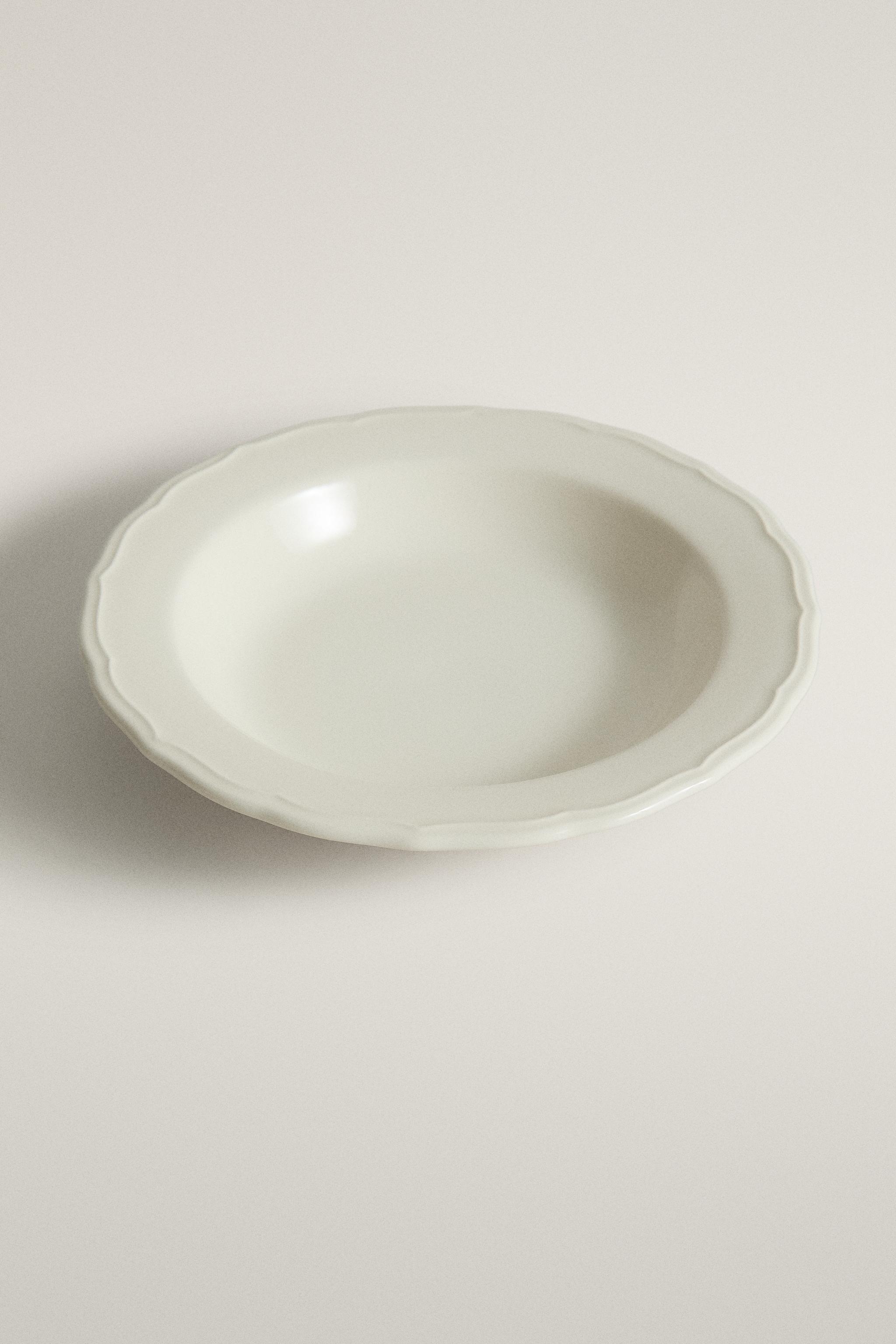 EARTHENWARE SOUP PLATE WITH RAISED-DESIGN EDGE