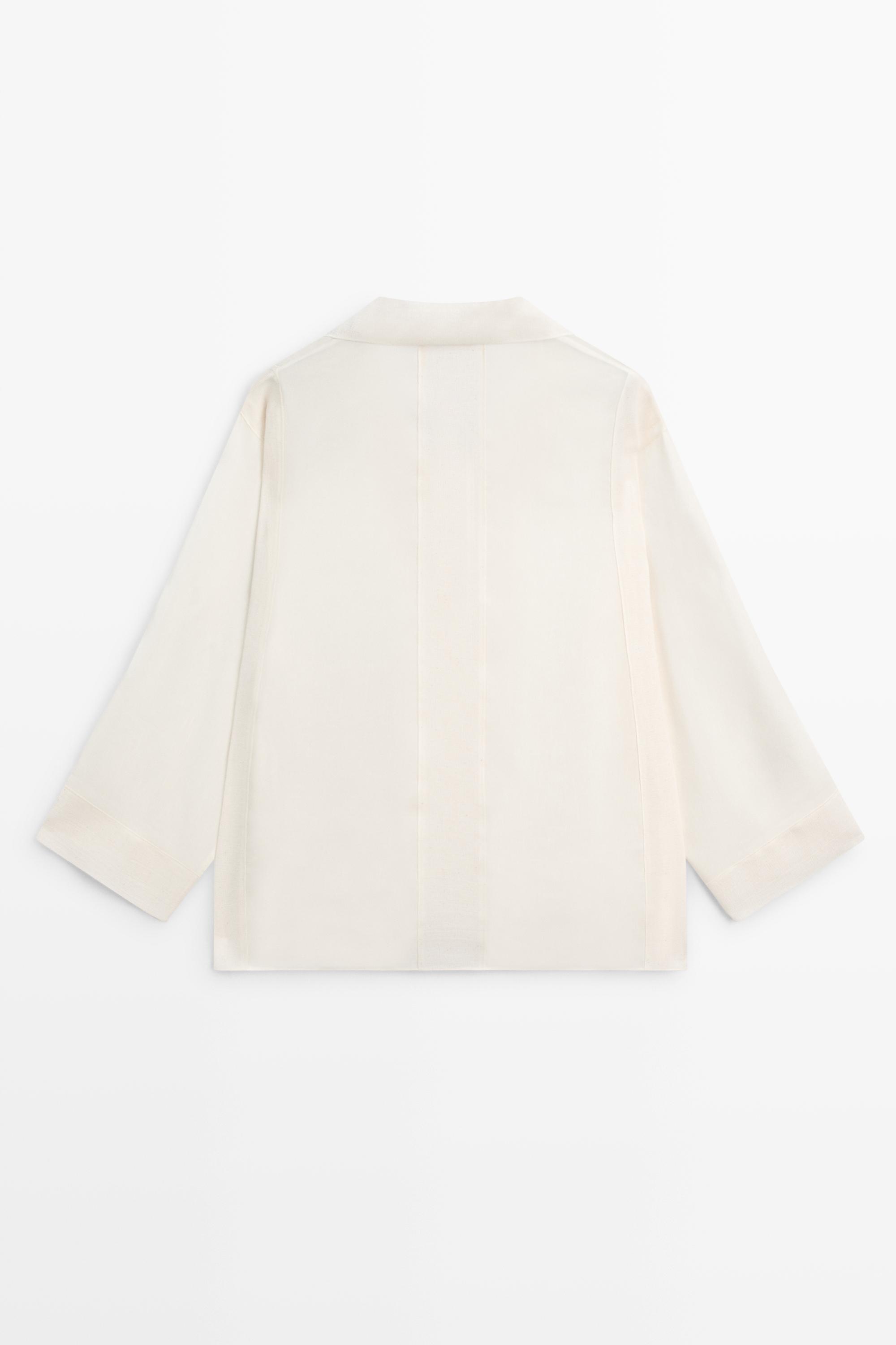 Flowing blouse with seam details