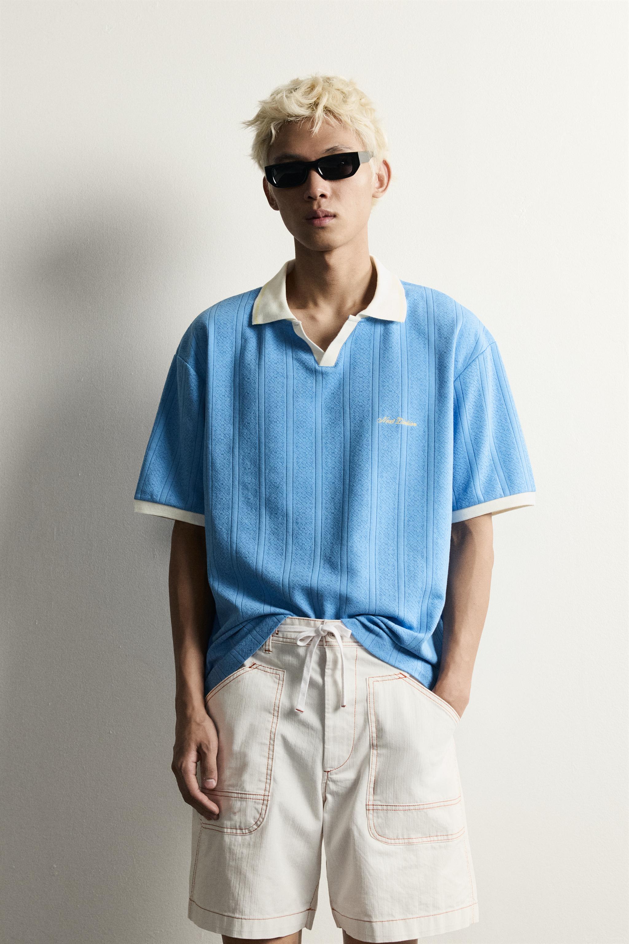 RELAXED FIT EMBROIDERED TEXT POLO — Light blue