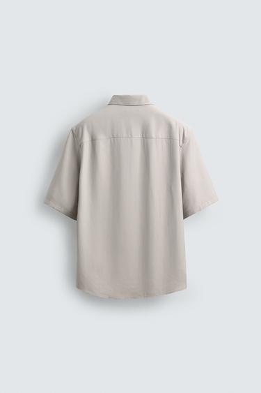 CHEMISE FLUIDE RELAXED FIT À POCHES - Gris perle de Zara - Image 7