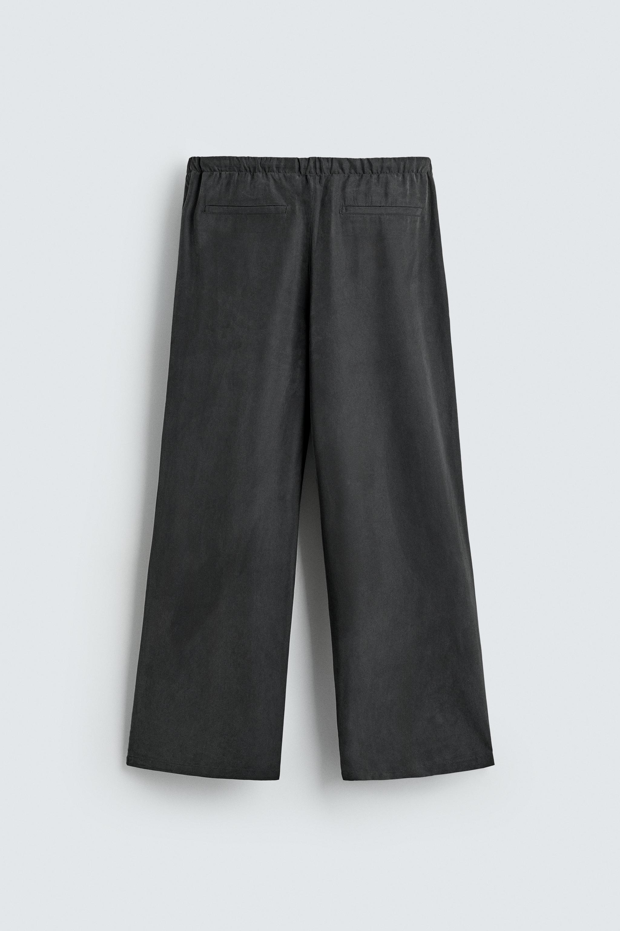 RELAXED FIT FLOWY PANTS