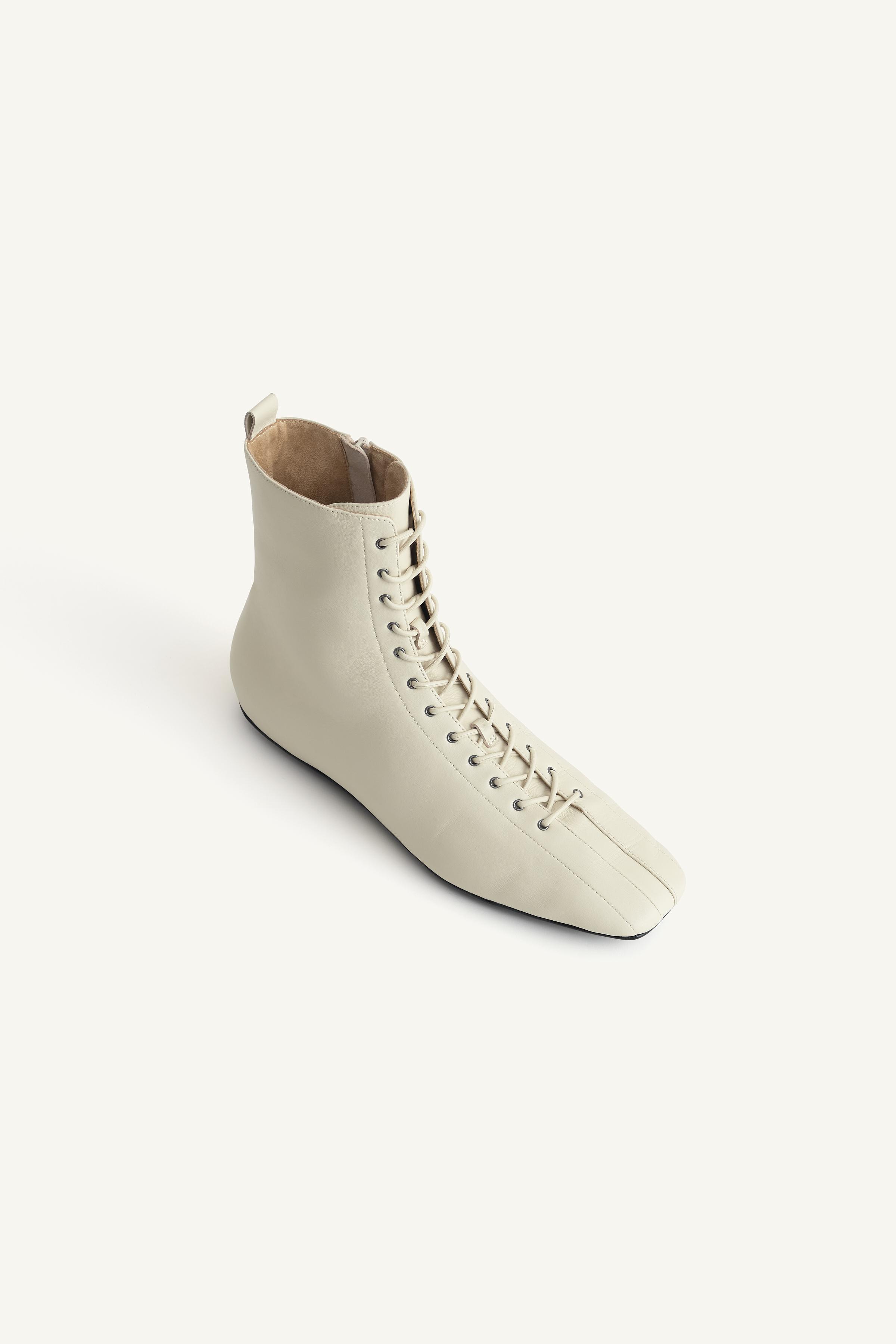 ZARA SRPLS LTHR BTS 13 センタージップブーツ 14100710002-e2.jpg?ts=