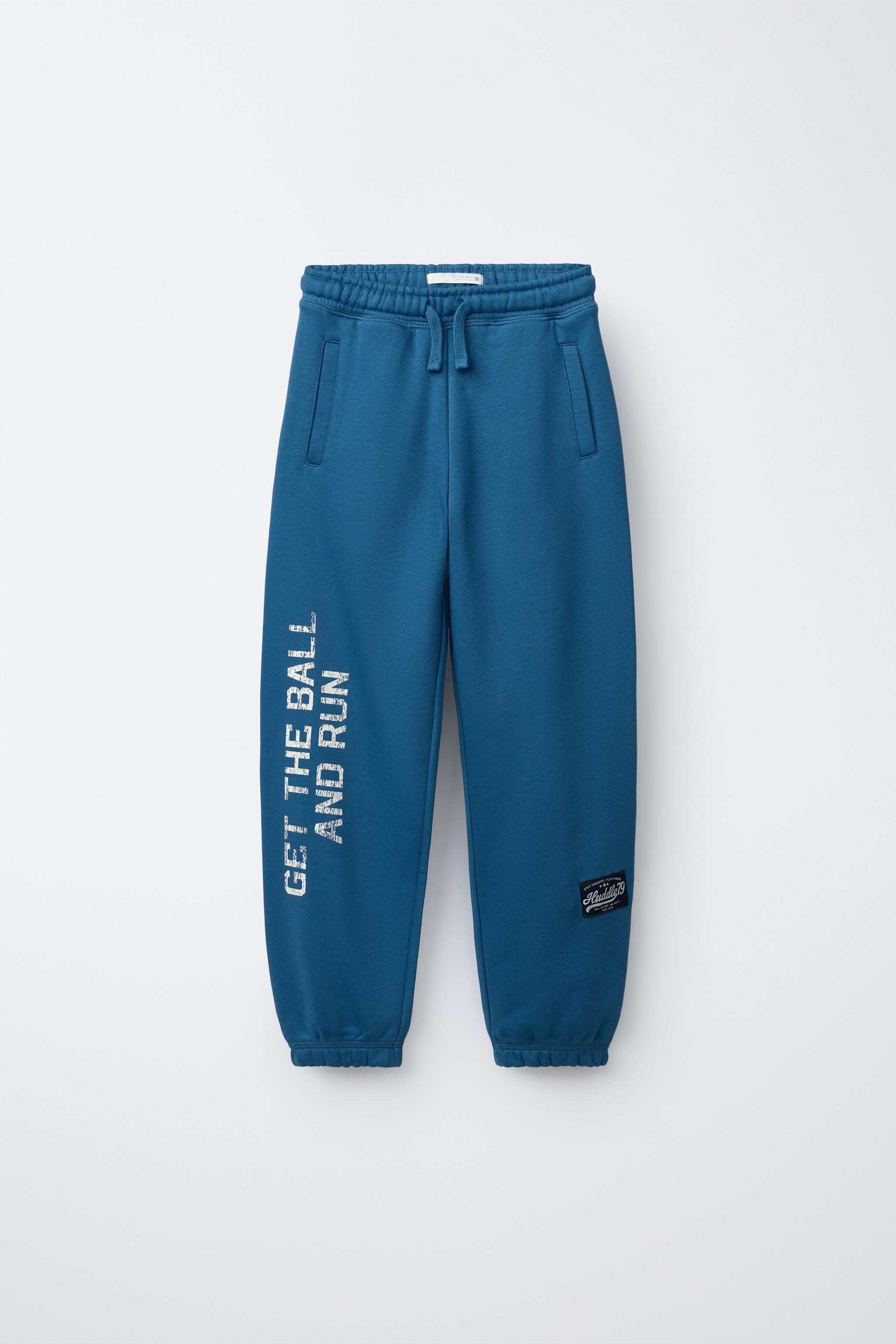 PANTALON DE JOGGING AVEC INSCRIPTION ET ÉTIQUETTE