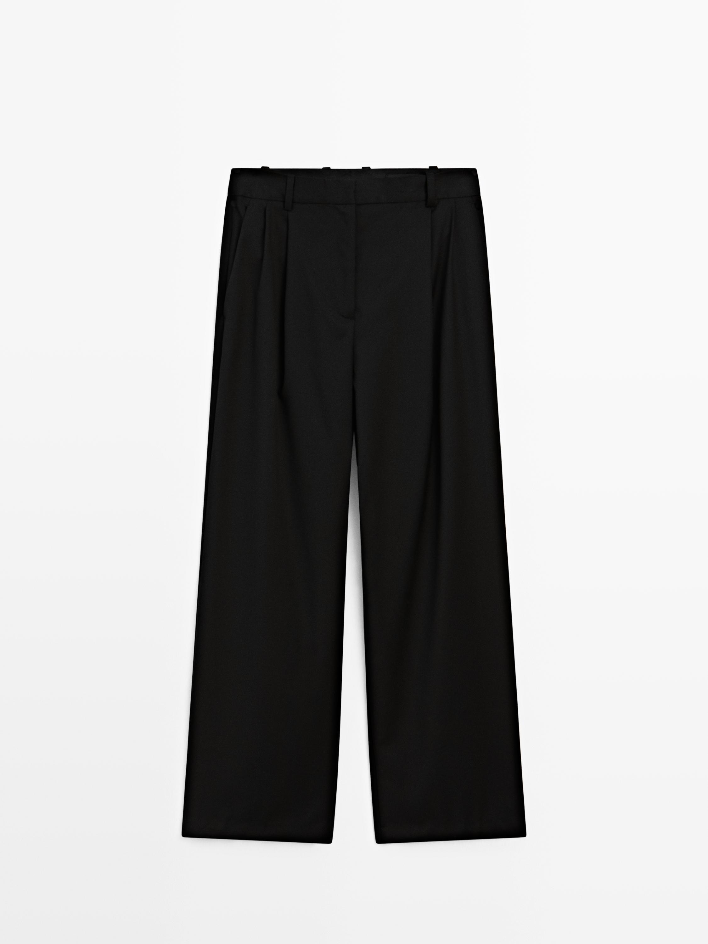 Pleated extra fine wool trousers