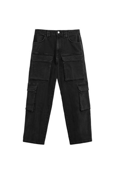Front view of black cargo trousers with large pockets and front button fastening.
