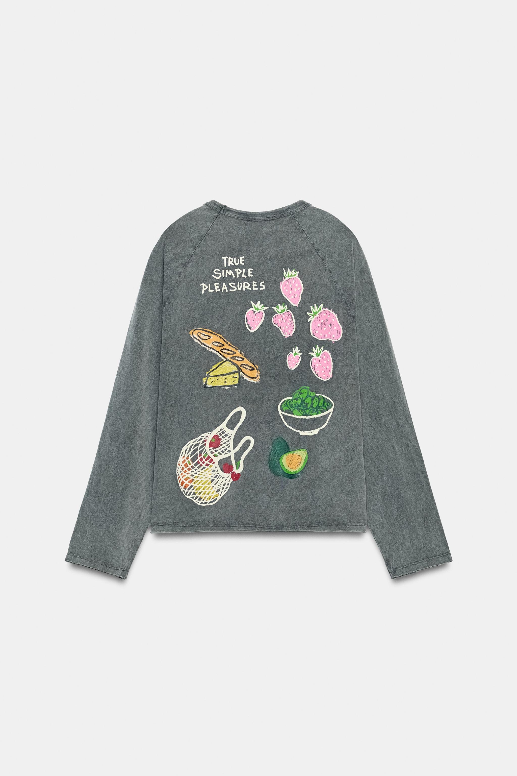 T-SHIRT À EFFET DÉLAVÉ ET DESSINS
