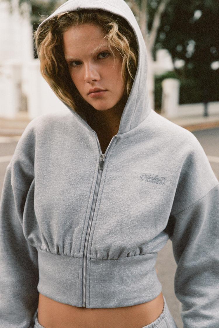 Sudadera cropped glitter