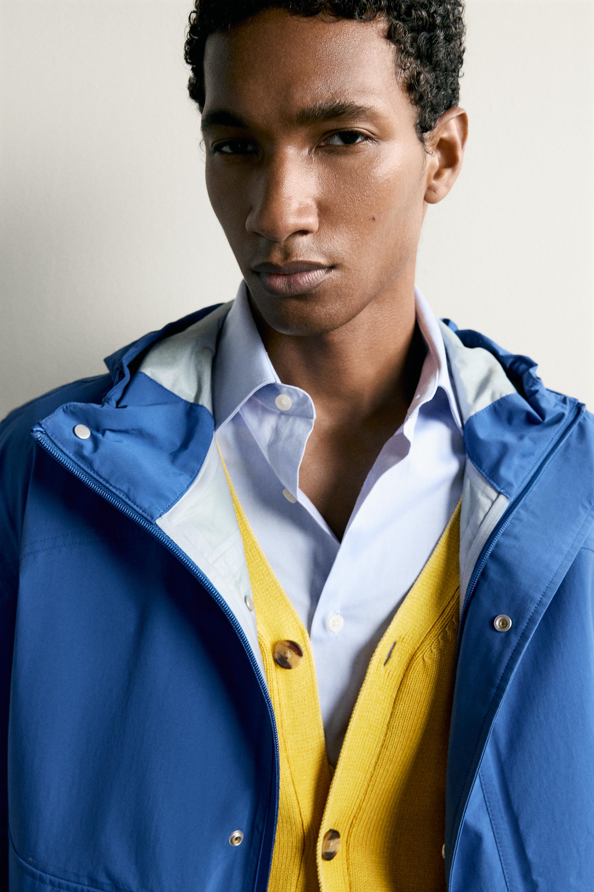 RELAXED FIT HOODED TECHNICAL JACKET