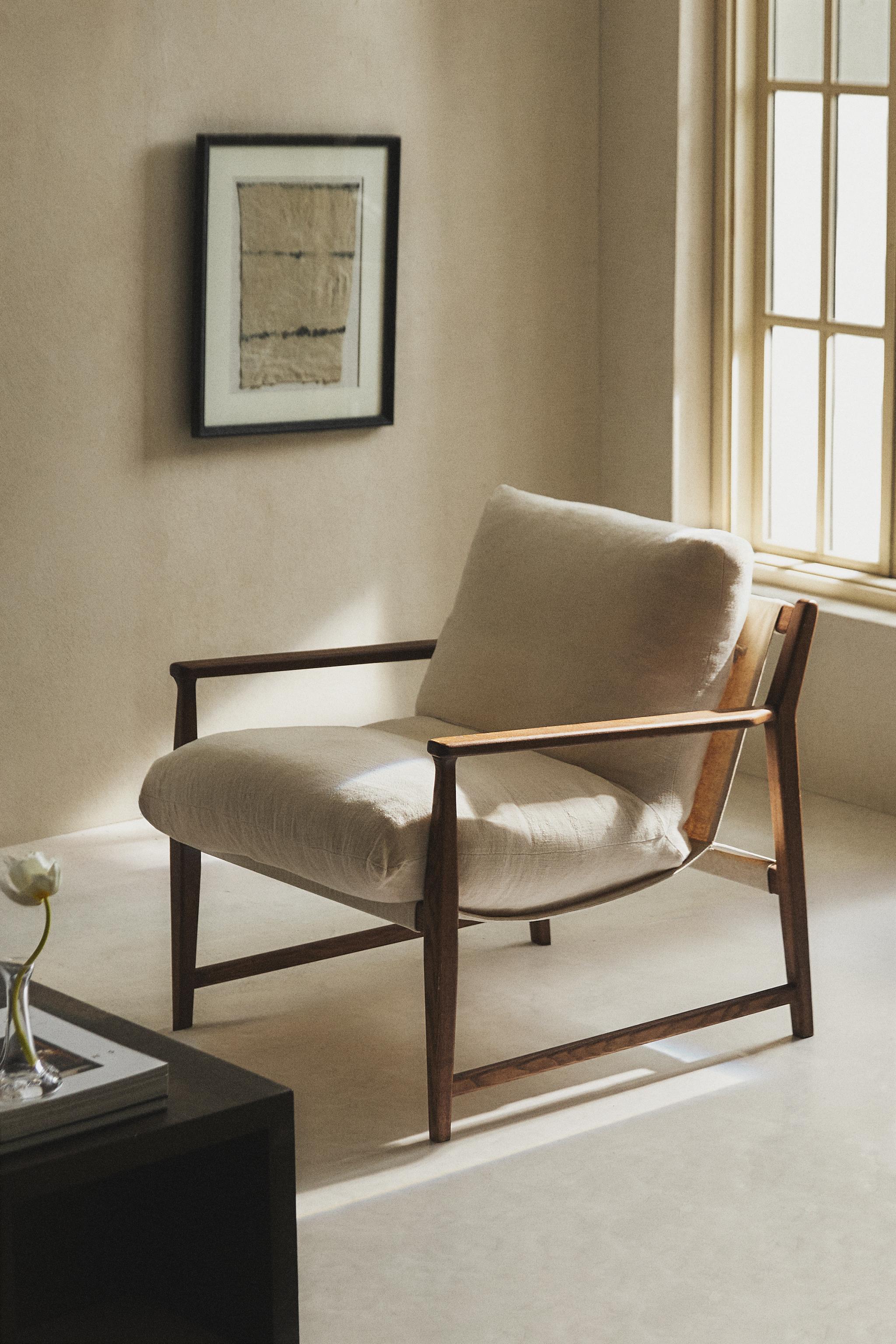 FAUTEUIL EN BOIS ET COUSSIN DÉHOUSSABLE